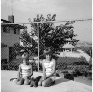 Me at age six with my sister Cindy and our cat Sam