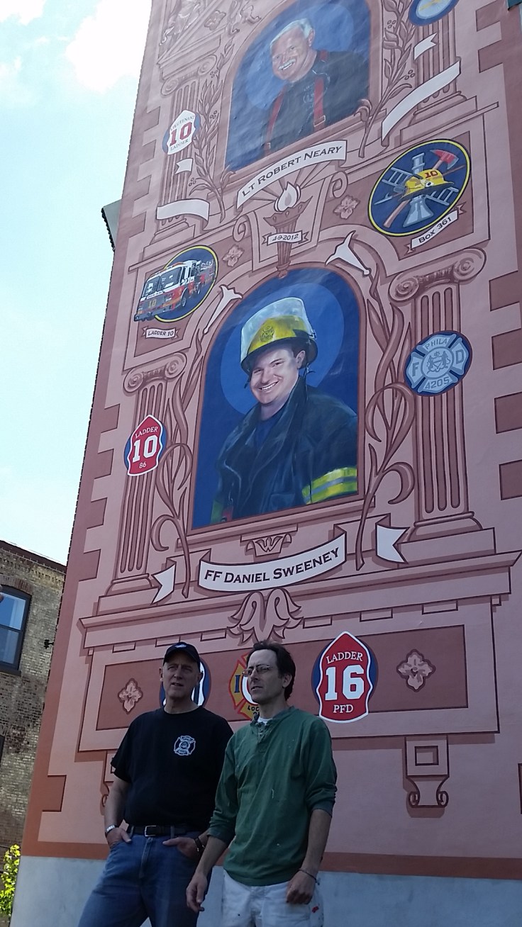 Artists Jesse Gardner and David McShane on the roof of 2024 East Arizona Street in Philadelphia